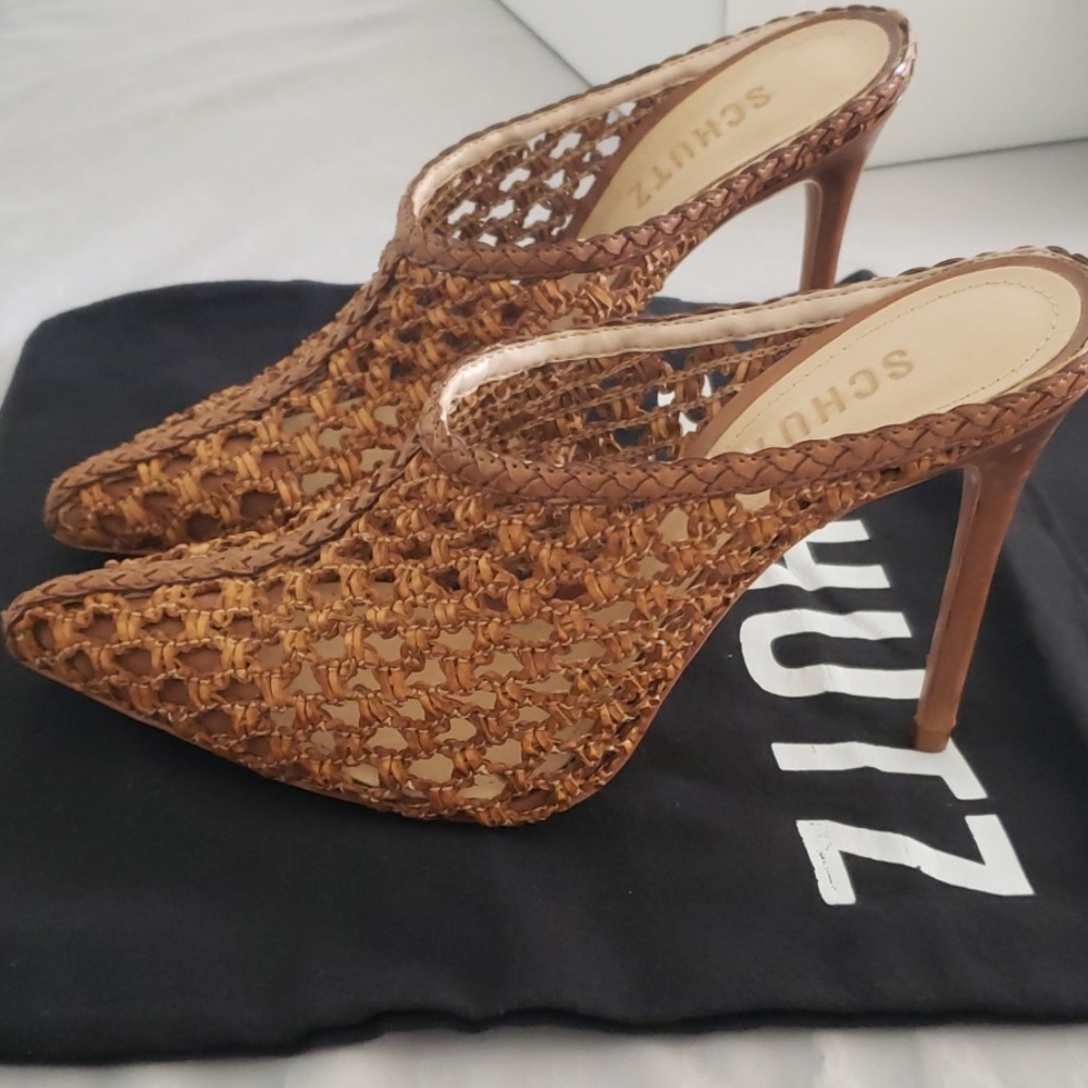 Amazing wood mules shoes.